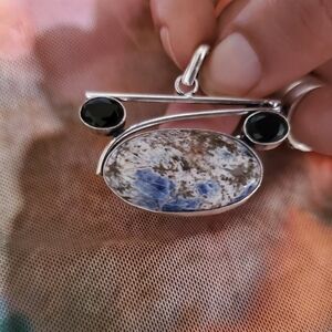 Elegant Silver and Black Stone Pendant